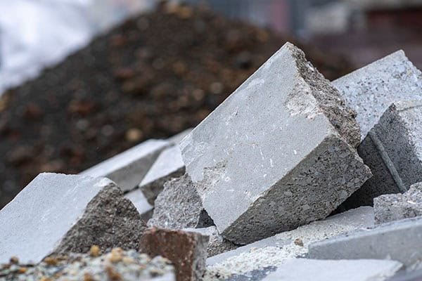 Pile of broken concrete pavers