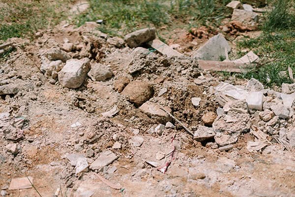 Pile of debris dirt and sand